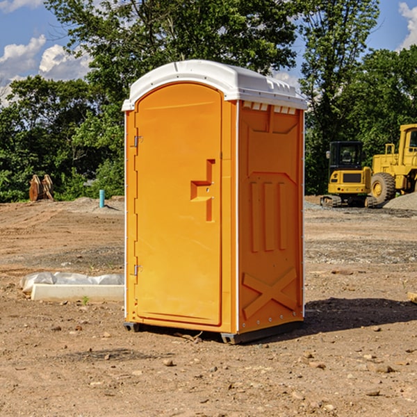 how often are the porta potties cleaned and serviced during a rental period in Lind